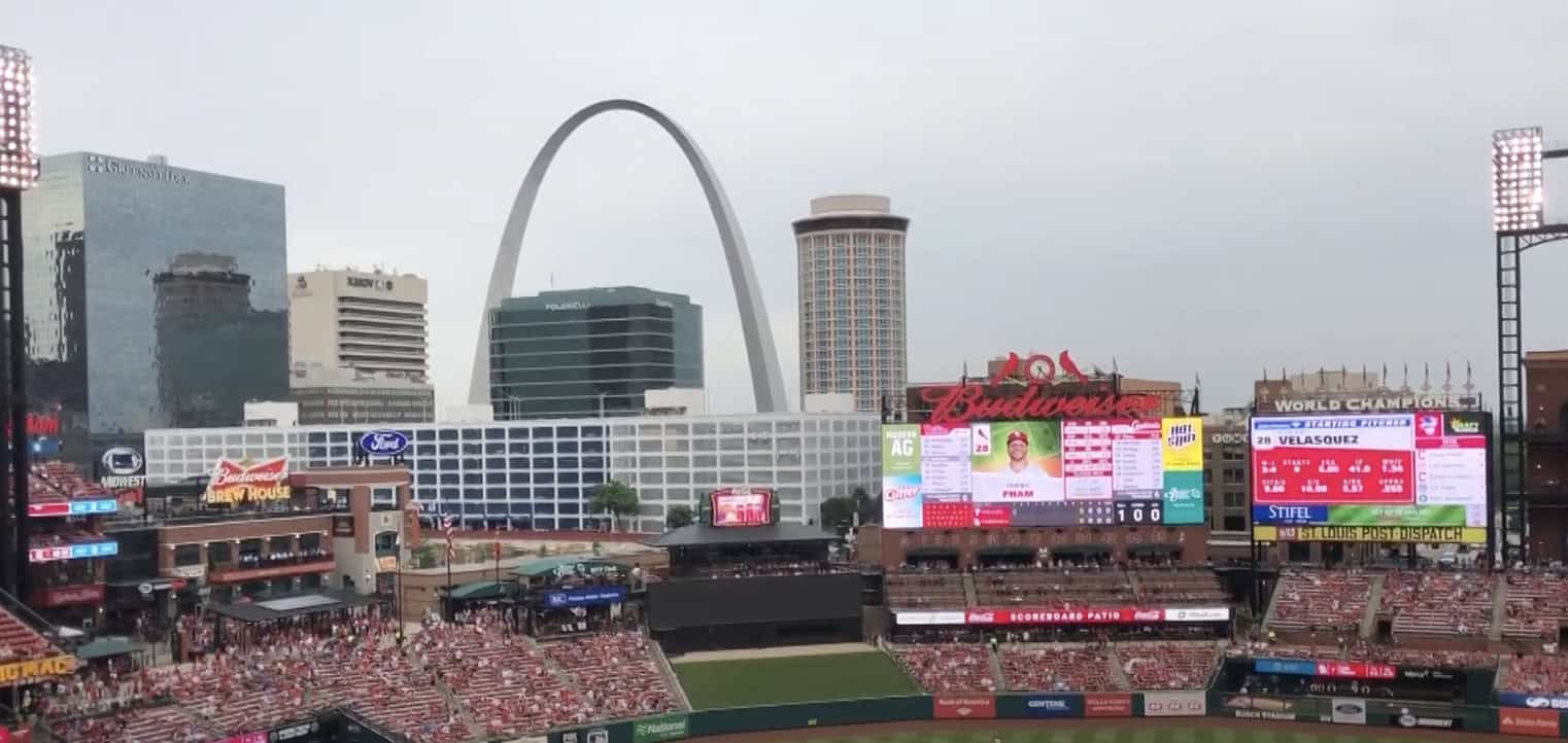 A vibrant view of Busch Stadium filled with excited fans enjoying a game day.